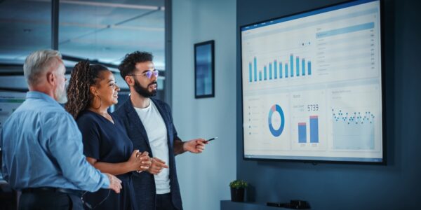 People in front of a chart